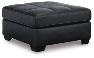 Everyday comfort meets versatile style in this oversized ottoman. The handsome hue of the goes-with-anything faux leather takes away the stress of styling, expertly pairing with your existing aesthetic. From kicking back on the weekends to relaxing post-w