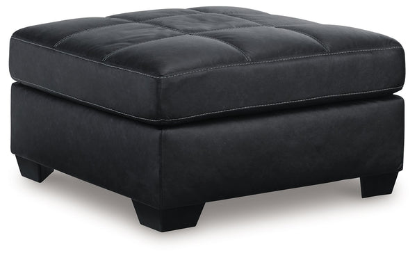 Everyday comfort meets versatile style in this oversized ottoman. The handsome hue of the goes-with-anything faux leather takes away the stress of styling, expertly pairing with your existing aesthetic. From kicking back on the weekends to relaxing post-w