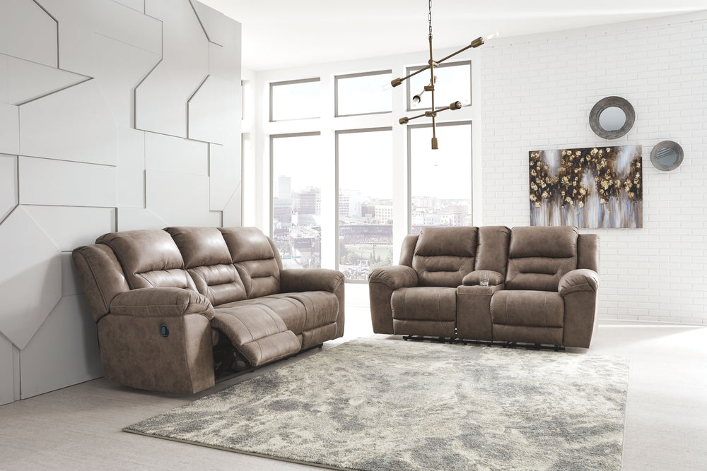For those that love the cool look of leather but long for the warm feel of fabric, this reclining set delivers both with ease. Its high-performance padded faux leather is remarkably durable and easy to clean, just the thing for family spaces. Channel-stit