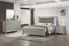 Discover the Radiance Western King 4 Piece Bedroom Set, comprising a Bed, Dresser, Mirror & Nightstand, meticulously crafted for enduring stability and durability from a combination of Solid Rubberwood and manufactured woods. Its semi-gloss lacquer Platin