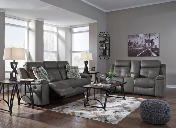 Rustic character comes forth in this dark gray reclining set. Designer stitching adds a fashion-forward touch to the soft cushions. Faux suede fabric speaks to your knack for superior-quality materials. High back provides ample support as you get off your