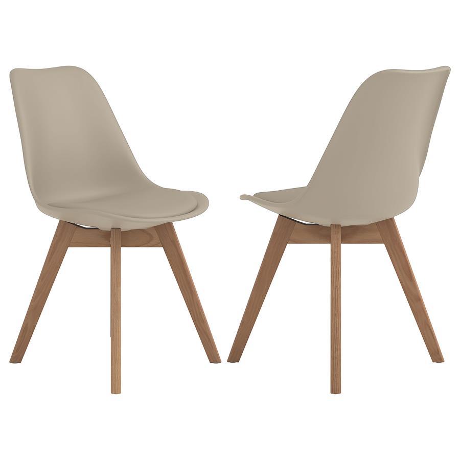 Add a touch of mid-century charm to your dining space with this tan side chair. The smooth faux leather seat and angled oak wood legs create a warm, modern aesthetic. Designed with durability and comfort in mind, it features a padded seat and a resilient 