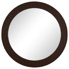 Offer artisan or industrial flair in any space with the textural flair of this round wall mirror. It-'s a modern design that features flat glass for easy reflectivity in any space. The round profile is accentuated with a MDF frame with fluting that create