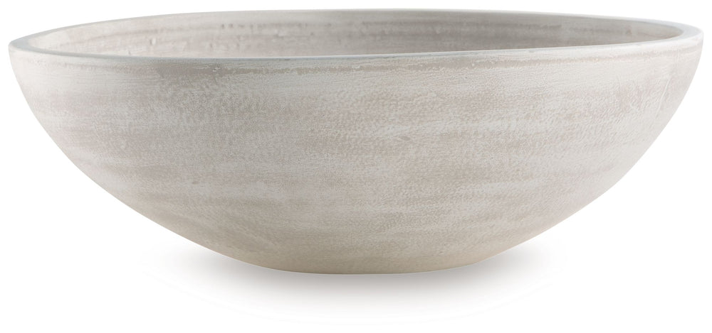 Celebrate the artisanal character of ceramics with this bowl. Its distressed white finish has a time-worn, weathered appeal, offering the look of the past with a modern feel. The bowl-'s neutral tone makes it a go-to for all seasons, allowing you to stage