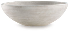 Celebrate the artisanal character of ceramics with this bowl. Its distressed white finish has a time-worn, weathered appeal, offering the look of the past with a modern feel. The bowl-'s neutral tone makes it a go-to for all seasons, allowing you to stage