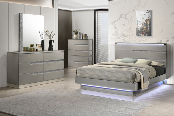 The Paradox 4 Piece Platform Bedroom Set in Gray is a stunning combination of contemporary style and functional elegance. This set includes a platform bed along with a dresser, mirror, and chest. The gleaming Gray gloss laminate finish offers a sleek, mod