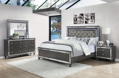 Elevate your sanctuary with this dazzling bedroom collection, where contemporary chic meets timeless charm. The suite boasts a stunning graphite finish, imbuing your space with an air of sophistication and modern luxury. At the heart lies a plush, tufted 