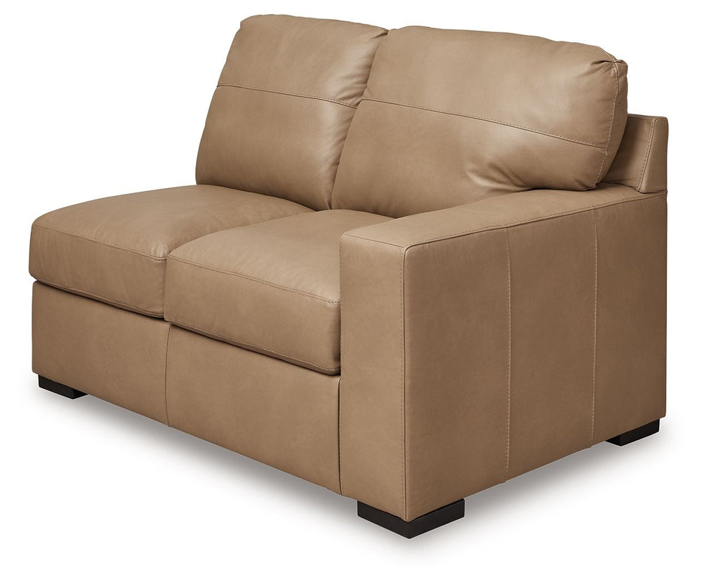 This right-arm facing loveseat is made with a combination of 100% top grain leather and faux leather upholstery. Pairs with other items in the series to make a sectional.<br><br><b>Additional Dimensions</b><br><ul><li>Arm height: 26-"</li><li>Seat depth: 