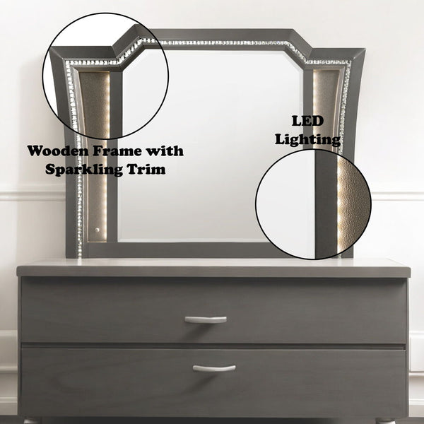  the mirror is accented with LED light and a crystal-like sparkling trim. Its crystal-like trimming creates dazzling g