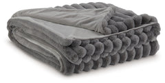 As cozy as they come, this faux fur throw turns your seating area into a haven of comfort. Its neutral hue acts as the perfect foundation for layering, whether mixed with pillows or draped over the arm of a sofa. And itâ€™s machine washable, so you can sp