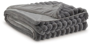 As cozy as they come, this faux fur throw turns your seating area into a haven of comfort. Its neutral hue acts as the perfect foundation for layering, whether mixed with pillows or draped over the arm of a sofa. And itâ€™s machine washable, so you can sp