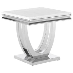 This end table combines modern glam and functional elegance with a sintered stone top featuring a marble-like appearance and beveled edges. Its sweeping demilune pedestal base in polished stainless steel provides stability while enhancing the sleek, conte