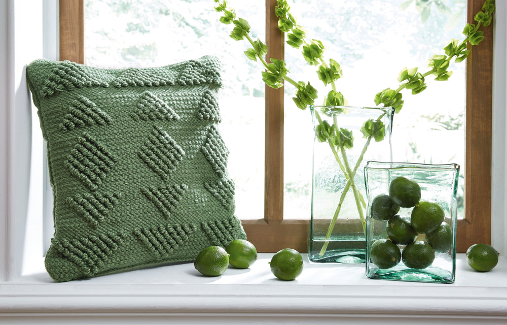 A super simple way to update your space, whether for season or style, is by adding a throw pillow here and there. Whether you put the pillow on your bed or couch, this accent cushion with a handwoven geometric design provides warmth and comfort with just 