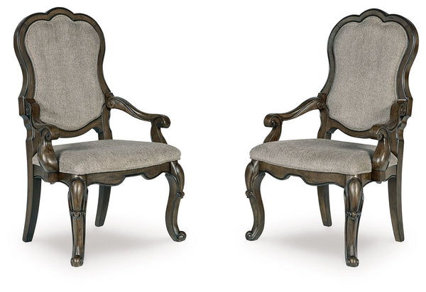 this dining armchair makes a bold statement. With shapely legs and a plush cushioned seat and back