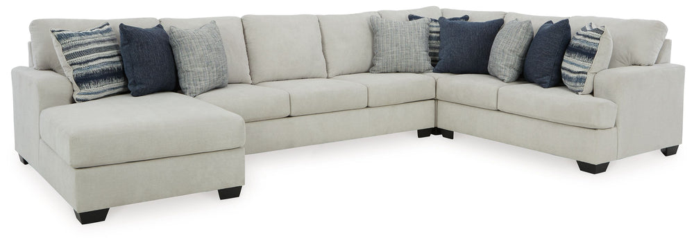What a pleasant surprise: high-end luxury made comfortably affordable. Thatâ€™s what makes this sectional with chaise in stone gray so alluring. Made exclusively for those wanting to make a designer statement, this finely crafted sectional is dressed to i