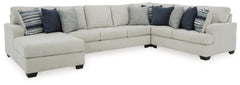 What a pleasant surprise: high-end luxury made comfortably affordable. Thatâ€™s what makes this sectional with chaise in stone gray so alluring. Made exclusively for those wanting to make a designer statement, this finely crafted sectional is dressed to i