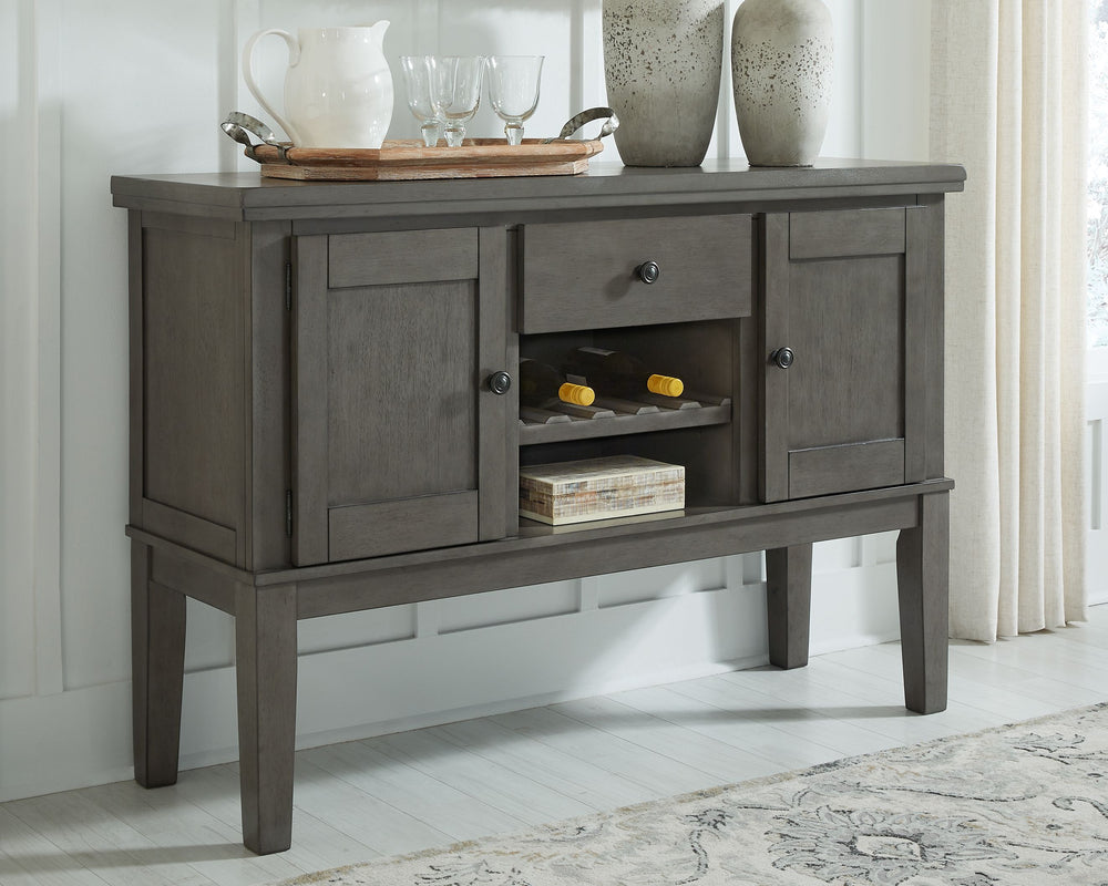 Cool and on-trend. This versatile server sports an antiqued gray color for a contemporary-yet-casual feel. The server features two cabinets, a smooth-gliding drawer and an open cubby with a wine rack, making it a breeze to clear away clutter and expand yo