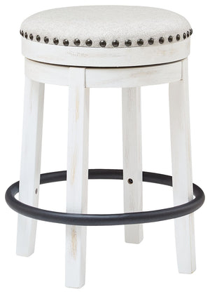 A touch of rustic-industrial style is such a fashion-forward choice, and this swivel stool doesnâ€™t disappoint. Its smooth swivel motion adds function, while nailhead trim brings effortless style. A softly upholstered cushion seat in beige keeps things c