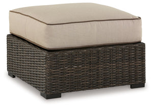 Who says the great outdoors isnâ€™t made for luxury living? This cushioned ottoman offers all the high-end design, plush comfort and durability you could ask for, and then some. Its all-weather, rust-proof aluminum frame provides the easy-breezy wicker lo