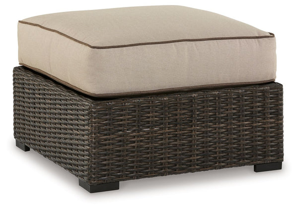 Who says the great outdoors isnâ€™t made for luxury living? This cushioned ottoman offers all the high-end design, plush comfort and durability you could ask for, and then some. Its all-weather, rust-proof aluminum frame provides the easy-breezy wicker lo