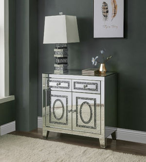  and shine to this functional piece. There are two doors and two dra