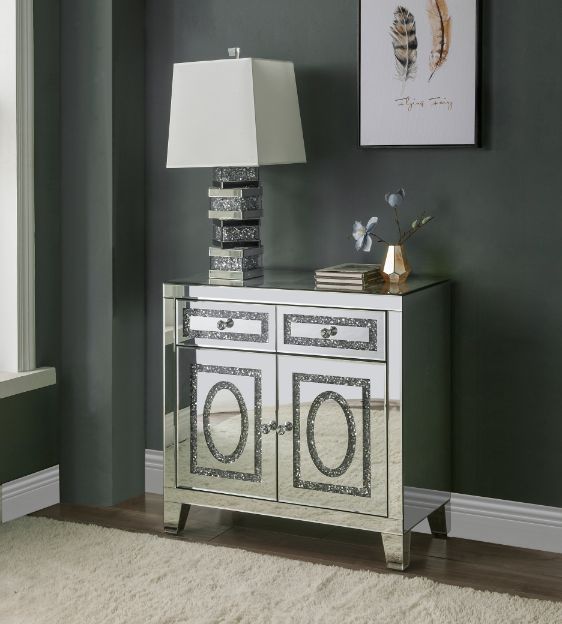  and shine to this functional piece. There are two doors and two dra