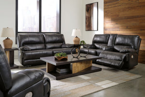 Striking form, meet contemporary function. This power reclining set combines your ideal comfort features, like one-touch reclining and adjustable headrests, into one sophisticated package. With a design defined by the luxe look of black leather, this set 
