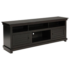 Introduce expansive storage underneath your flat panel television with this modern farmhouse TV stand. It-'s a wooden design with roughhewn details that offer charming texture and casual allure in your living room or den. Two cabinets offer decorative doo