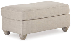 Donâ€™t be shyâ€”find your footing on this farmhouse-style ottoman. Dressed in a modern and relaxed linen-weave upholstery, itâ€™s a luxurious complement to rustic accents with its light and airy palette and elegantly turned feet. What a picture-perfect f
