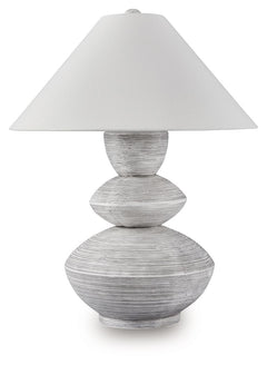Inspired by a classic pottery form, this triple gourd table lamp lightens the mood with a sense of ease and organic style. A distressed white finish adds a layer of interest to the base. Use it in pairs for double the impact in a bedroom, living area or e