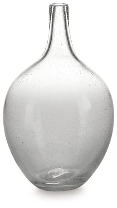 Infuse your shelf, mantel or tabletop with casual charm. Crafted from clear seeded glass, this vase effortlessly captures the essence of weathered beauty. Whether it-'s indoors or outdoors, this vessel is enchantingly simple unadorned or filled with your 