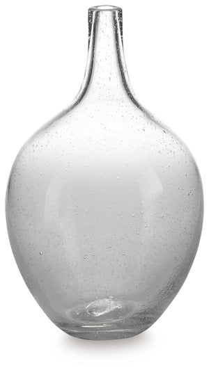 Infuse your shelf, mantel or tabletop with casual charm. Crafted from clear seeded glass, this vase effortlessly captures the essence of weathered beauty. Whether it-'s indoors or outdoors, this vessel is enchantingly simple unadorned or filled with your 