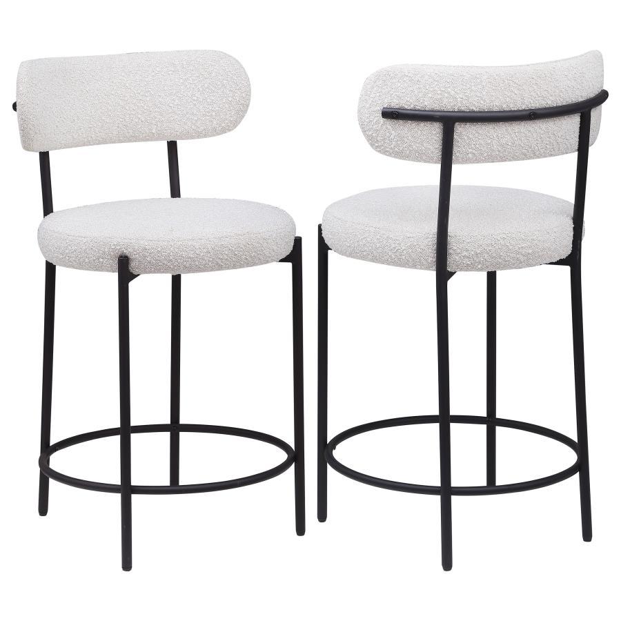 Your kitchen island or counter table gets an instant upgrade with this set of two modern barstools. The pair features contemporary boucle upholstery in a neutral hue over foam cushions for comfort. Metal framing features a black finish and provides excell
