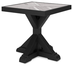 Sporting an easy-on-the-eyes elegance, this end table elevates the art of alfresco living. Beautiful and durable enough for indoor and outdoor use, this high-style/low-maintenance table charms with X-leg farmhouse styling. With a unique reverse diamond ti
