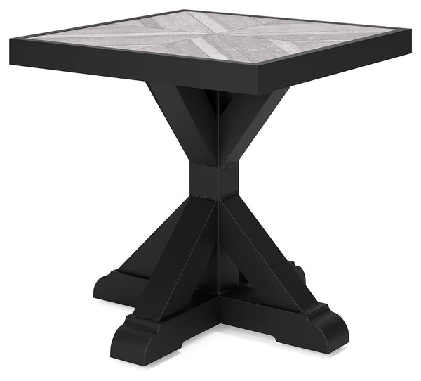 Sporting an easy-on-the-eyes elegance, this end table elevates the art of alfresco living. Beautiful and durable enough for indoor and outdoor use, this high-style/low-maintenance table charms with X-leg farmhouse styling. With a unique reverse diamond ti
