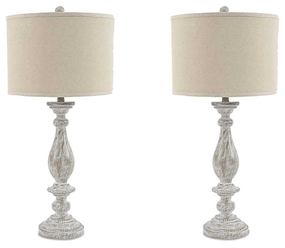 With its whitewash finish, this table lamp is full of character and style. Its candlestick design and drum shade will add a dose of casual chicness to your living space.<br><br><b>Additional Dimensions</b><br><ul><li>Shade: 0-"</li><li>Base: 0-"</li><li>C