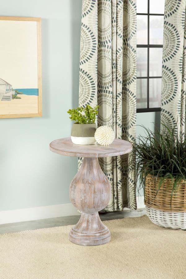 Showcasing an alluring silhouette, this modern side table offers a stylish blend of art and sophistication. A pedestal design doubles down on elegance and creates an eye-catching look. Infuse romantic charm to a living space or entryway with a table featu