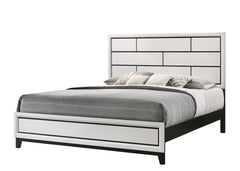 This contemporary bedroom set presents a crisp, clean look with its white finish and contrasting dark accents. The simple, straight lines and subtle details give it a modern edge. The bed features a paneled headboard that makes a statement without overwhe