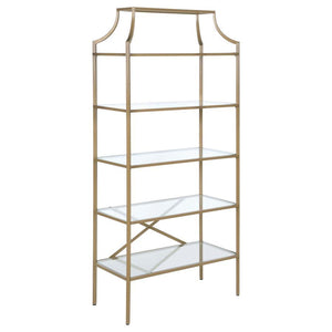 A call for strength and style gets answered by this bookcase. Contemporary style allows for easy placement within your space. The stylish metal frame in gold creates conversation. Enjoy durability as all glass elements are tempered. Updated unit boasts fi