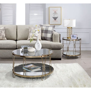 KD, Drum Coffee Table â€¢ Storage: Open Compartment (Mirrored Shelf, Fixed) â€¢ Features: Mirrored Top & Shelf, Drum Shape, Metal Frame (Open Base) â€¢â€¢ CONSTRUCTION â€¢â€¢ TOP/SHELF) 5mm Mirror â€¢ BASE) Drum Shape, Metal Base: Champagne finish, Metal 