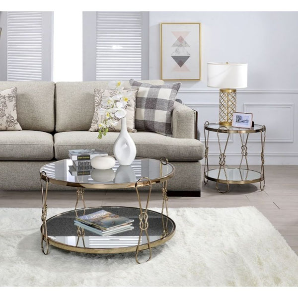 KD, Drum Coffee Table â€¢ Storage: Open Compartment (Mirrored Shelf, Fixed) â€¢ Features: Mirrored Top & Shelf, Drum Shape, Metal Frame (Open Base) â€¢â€¢ CONSTRUCTION â€¢â€¢ TOP/SHELF) 5mm Mirror â€¢ BASE) Drum Shape, Metal Base: Champagne finish, Metal 