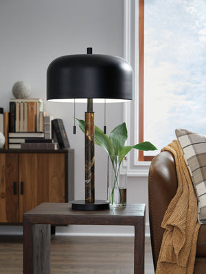 this table lamp is an instant classic. Crafted with dark brown marble and black metal
