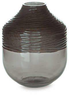 The accent is on contemporary with this exquisite glass vase. Its cool iridescent gray finish and hand-carved pattern deliver a sophisticated statement wherever you like. For those with an artful eye and a love of modern elegance, it-'s a beauty to behold