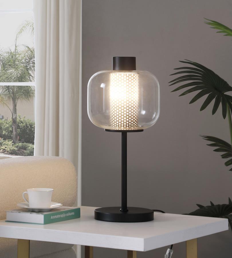 Steeped in vintage inspirations, this modern industrial table lamp is a charming choice for your nightstand or side table. Inside, a 9-watt LED bulb ensures energy efficiency and bright illumination. A metal mesh column in chic black creates depth and tex