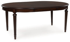 Serve up elegance and poise with this dining extension table. Its traditional silhouette is detailed with reeded legs for added opulence. A removable leaf effortlessly extends the table when guests drop in. From everyday meals to hosting family and friend