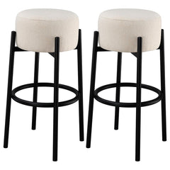 Casual with sleek lines, slide this pair of contemporary stools up to a bar or kitchen breakfast area. Designed with a thick pouf-like cushion wrapped in a white upholstery, this stool lends an elegant playful charm to any space. The pouf-inspired seat re