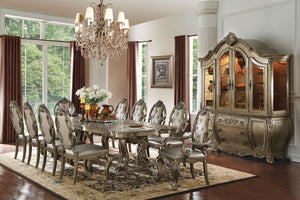 The Ragenardus formal dining collection shows traditional style that is designed to impress. Each piece of this collection demonstrates delicate craftsmanship and intricate carved details. Matching hutch and buffet reflect all carefully selected design th