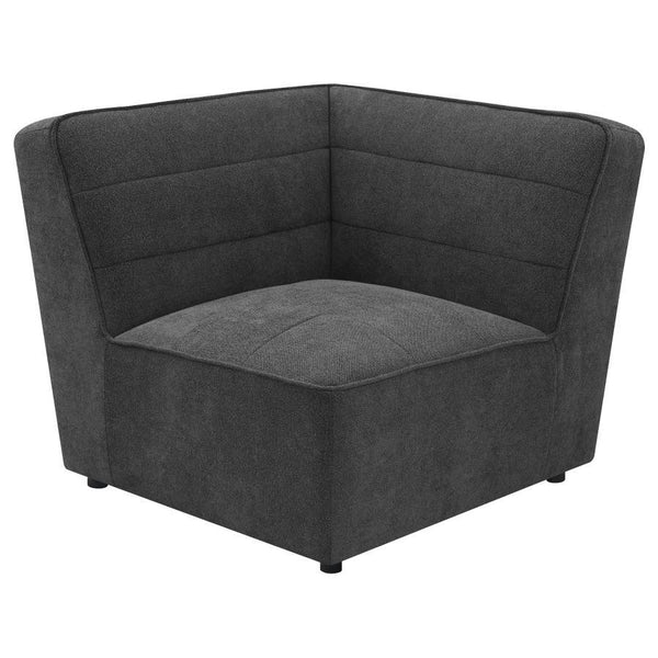  it boasts flared arms and meticulous button-tufting