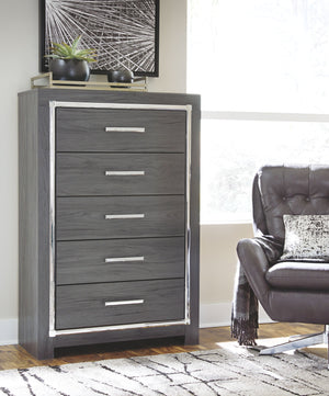  this chest of drawers interprets luxury in a decidedly modern way. A dazzling gray finish and faceted chrome-tone accents enhance the star power. Five smooth-gliding drawers provide enough storage to appease