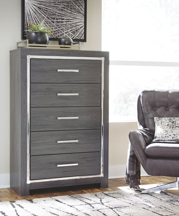 this chest of drawers interprets luxury in a decidedly modern way. A dazzling gray finish and faceted chrome-tone accents enhance the star power. Five smooth-gliding drawers provide enough storage to appease